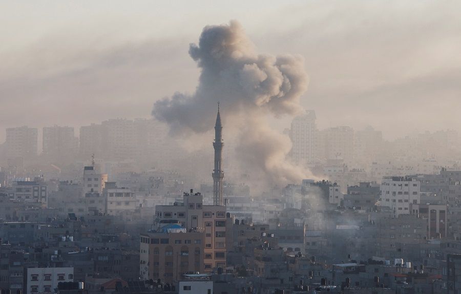 Smoke billows following Israeli strikes amid the ongoing conflict between Israel and Hamas, in Gaza, on 13 October 2023. (Mohammed Salem/Reuters)