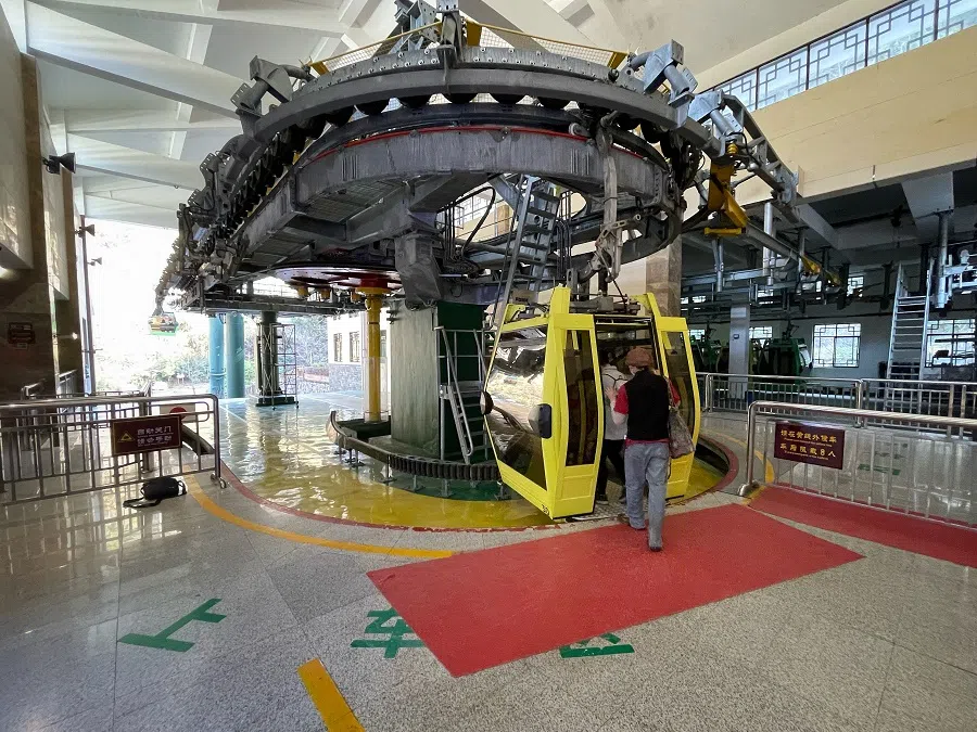 People board a cable car in Zhangjiajie, 8 January 2023.