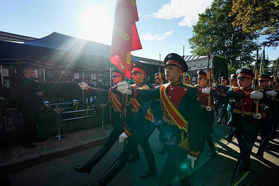 A guard of honour walks past the grave of Mikhail Gorbachev, the last leader of the Soviet Union, during a funeral ceremony at the Novodevichy Cemetery in Moscow, Russia, on 3 September 2022. (Alexander Zemlianichenko/Pool/AFP)