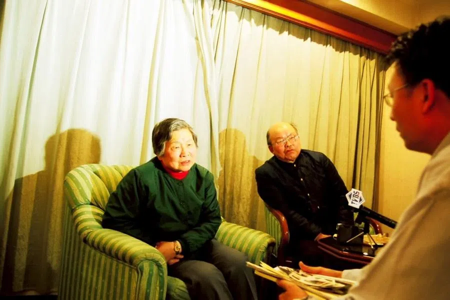 Zhu Xiaofeng and her husband Mr Xu in Shanghai in 2003, asking me to assist in locating the remains of her mother, Zhu Feng.