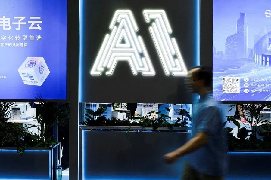 A person visits the World Artificial Intelligence Conference in Shanghai, China, 26 July 2025. (Go Nakamura/Reuters)