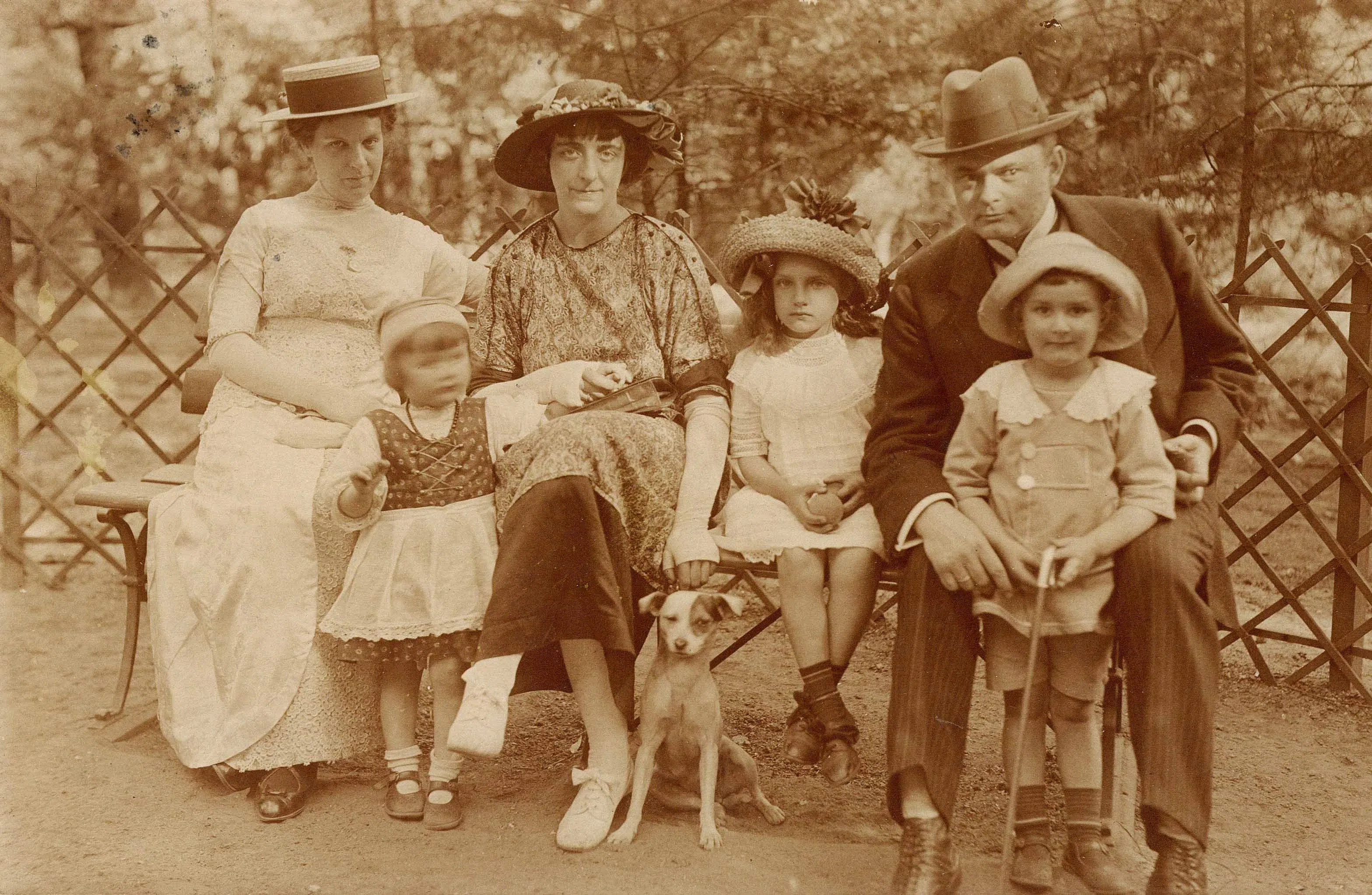Margot Grzywacz (seated, second from left) with family friends.