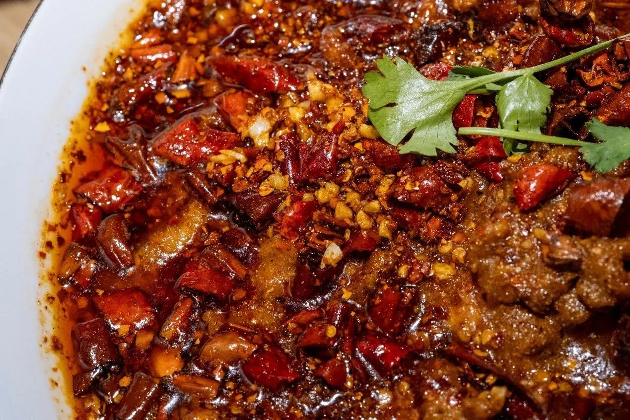 This classic Sichuan dish of beef served in a deep pool of chilli oil is a characteristic example of Sichuan cuisine’s formidable appearance. (Patrick Fleming)