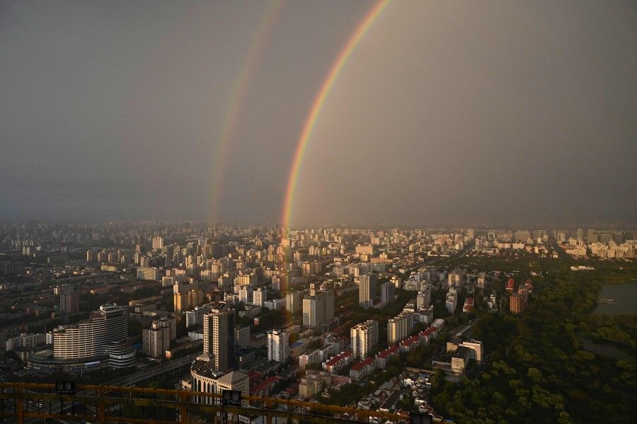 A double rainbow is seen from the Central Television Tower in Beijing on 26 August 2021. (Jade Gao/AFP)