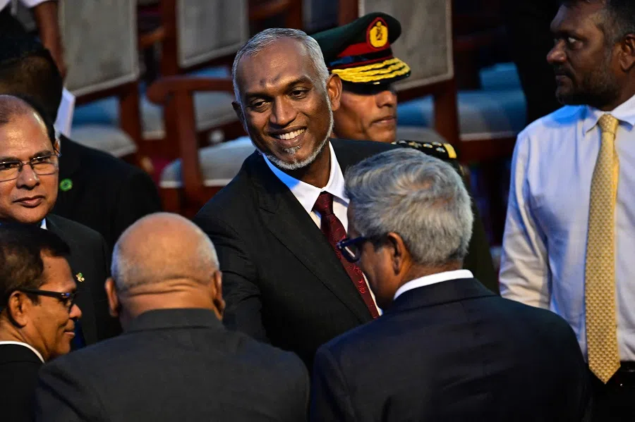 Maldivian President Mohamed Muizzu (centre) leaves his inauguration ceremony in Male on 17 November 2023. (Ishara S. Kodikara/AFP)