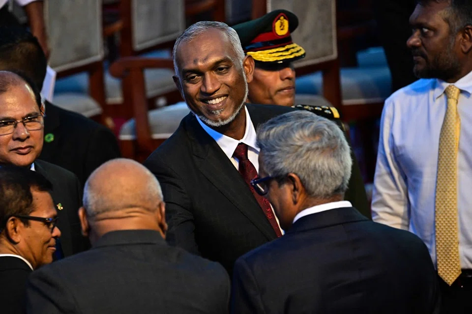 Maldivian President Mohamed Muizzu (centre) leaves his inauguration ceremony in Male on 17 November 2023. (Ishara S. Kodikara/AFP)