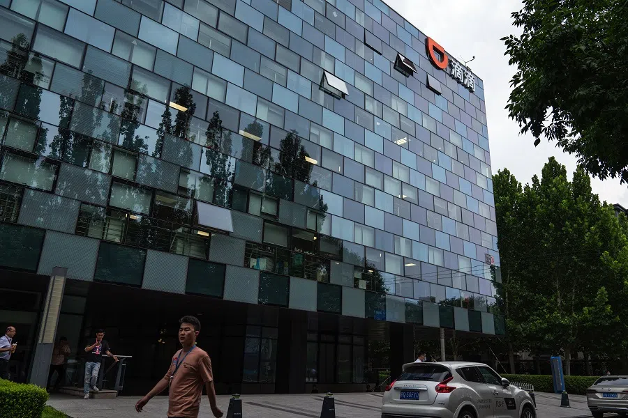 A pedestrian passes Didi Global Inc. headquarters in Beijing, China, on 5 July 2021. (Yan Cong/Bloomberg)