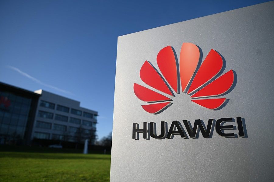 In this file photo taken on 28 January 2020, the logo of Chinese company Huawei is seen at their main UK offices in Reading, west of London. (Daniel Leal-Olivas/AFP)