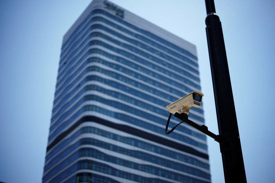 A surveillance camera is seen in front of an office building, where the office of Capvision is located, in Shanghai, China, 9 May 2023. (Aly Song/Reuters)