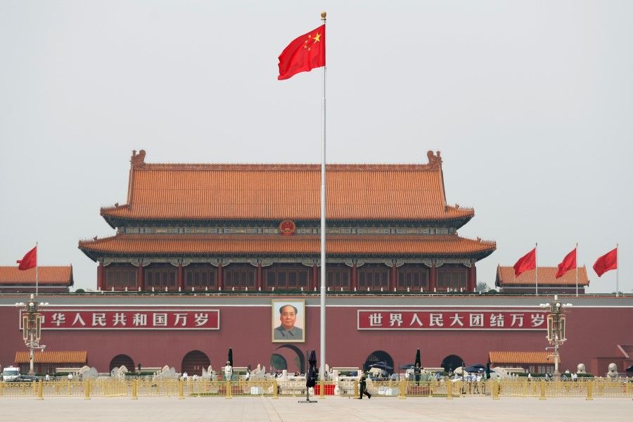 The Chinese flag flutters on Tiananmen Square before the opening session of the Chinese People's Political Consultative Conference (CPPCC) in Beijing, 21 May 2020. (Carlos Garcia Rawlins/REUTERS)