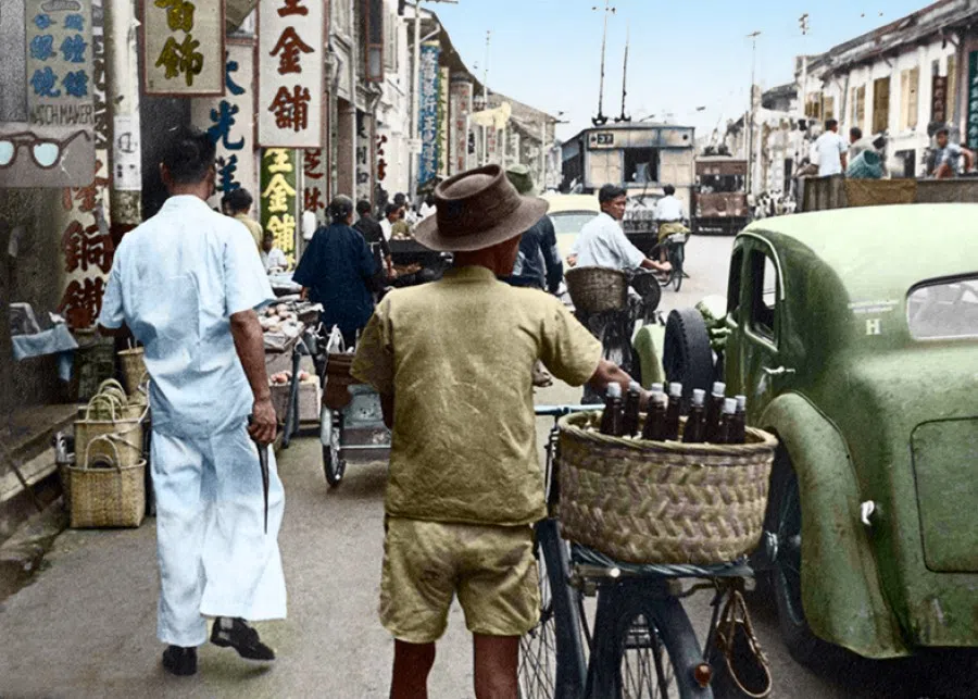 The bustling streets of Kreta Ayer in the 1920s. Many Chinese became involved in consumer-oriented light industries and commerce, creating a vibrant, prosperous colonial economy. Kreta Ayer became a lively commercial and residential area.