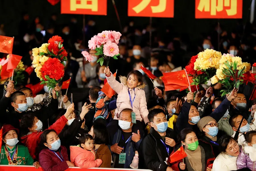 People take part in a ceremony before the launch of the Long March-2F Y13 rocket, carrying the Shenzhou-13 spacecraft and three astronauts in China's second crewed mission to build its own space station, at Jiuquan Satellite Launch Center near Jiuquan, Gansu province, China, 15 October 2021. (Carlos Garcia Rawlins/Reuters)