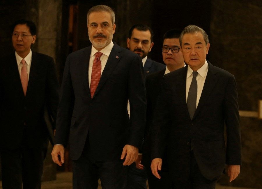Turkish Foreign Minister Hakan Fidan meets with Chinese Foreign Minister Wang Yi in Ankara, Turkey, on 26 July 2023. (Stringer/Pool via Reuters)