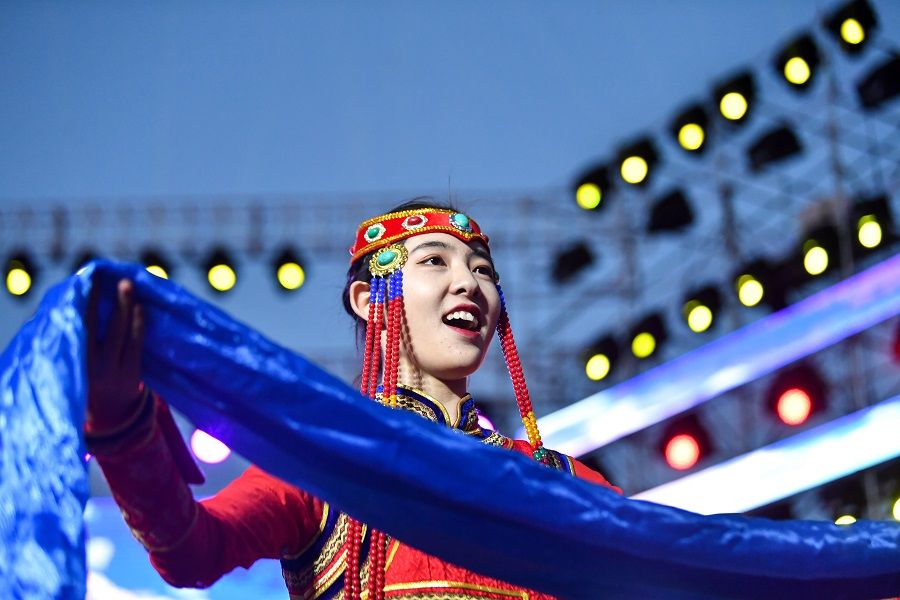 This photo taken on 26 June 2020 shows a performer at the opening ceremony of the 2020 Music and Food Festival of Grassland in Hohhot. (Bei He/Xinhua)