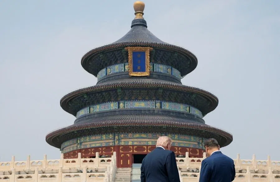 US President Donald Trump and Chinese President Xi Jinping tour the Temple of Heaven in Beijing, China, 14 May 2026.