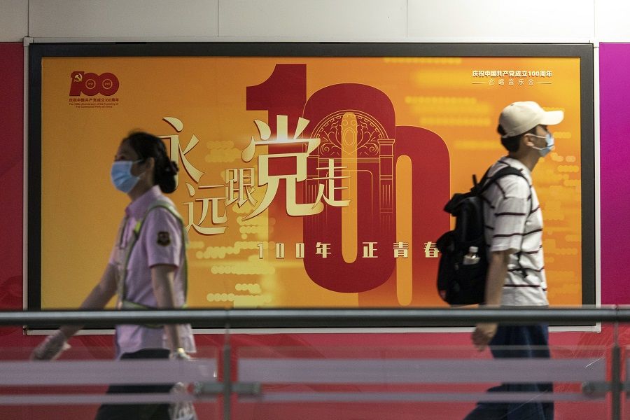 A banner marking the centenary of the Chinese Community Party is seen at a subway station in Shanghai, China on 28 June 2021. (Qilai Shen/Bloomberg)
