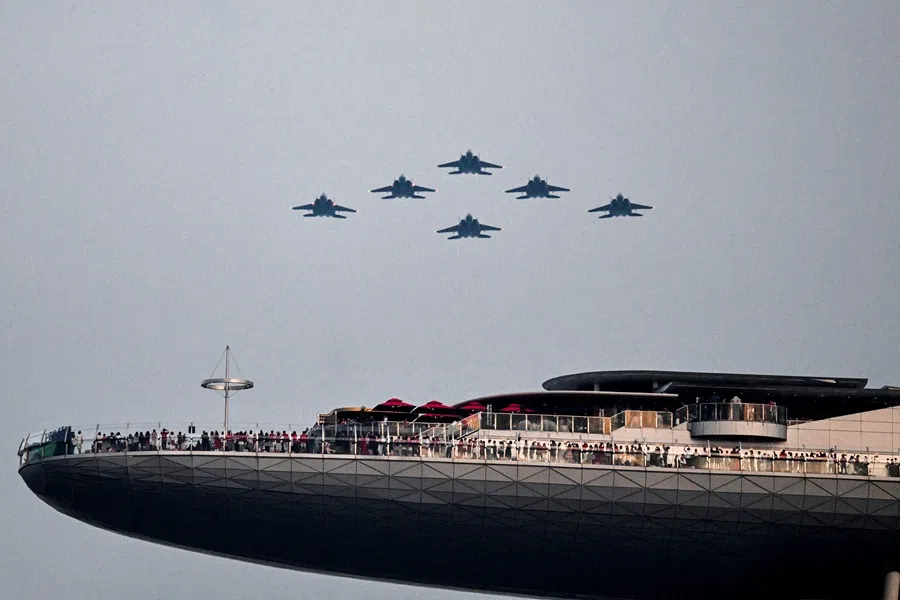 The aerial flypast is performed by the Singapore Armed Forces at the 60th National Day Parade in Singapore on 9 August 2025. (Caroline Chia/Reuters)