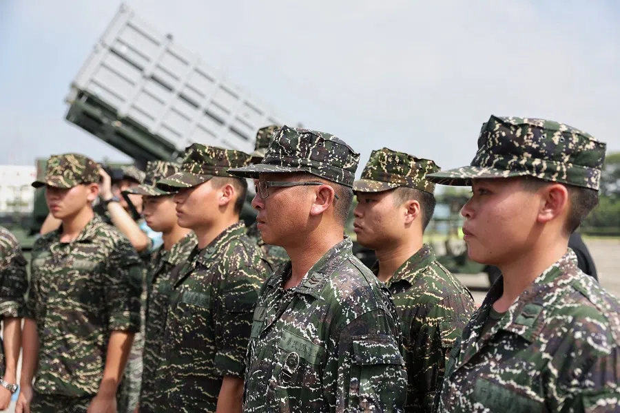 Soldiers stand in front of an anti-ship missile group named “Hai Feng” at a naval base in Taoyuan, Taiwan, on 18 October 2024. (I-Hwa Cheng/AFP)