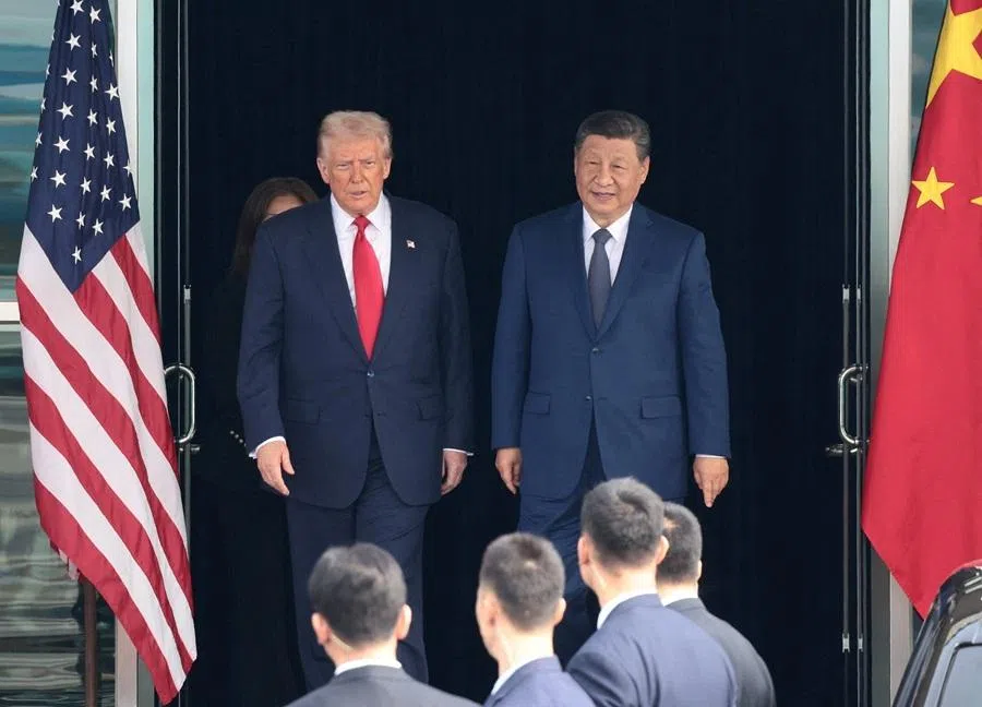 US President Donald Trump and Chinese President Xi Jinping walk as they leave after a bilateral meeting at Gimhae International Airport, on the sidelines of the Asia-Pacific Economic Cooperation (APEC) summit, in Busan, South Korea, on 30 October 2025. (Evelyn Hockstein/Reuters)