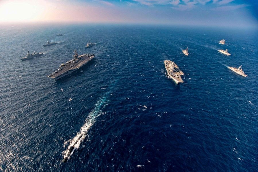 This handout photo taken and released by the Indian Navy on 17 November 2020 shows ships taking part in the second phase of the Malabar naval exercise in the Arabian sea. India, Australia, Japan and the United States started the second phase of a strategic navy drill in the Northern Arabian sea. (Indian Navy/AFP)