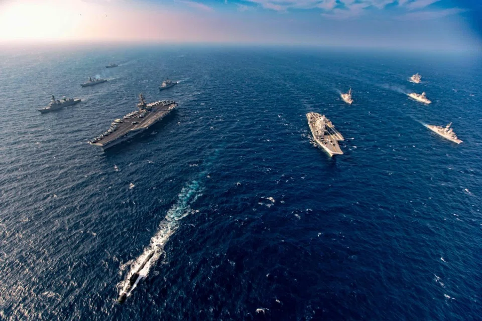 This handout photo taken and released by the Indian Navy on 17 November 2020 shows ships taking part in the second phase of the Malabar naval exercise in the Arabian sea. India, Australia, Japan and the United States started the second phase of a strategic navy drill on 17 November in the Northern Arabian sea. (Indian Navy/AFP)