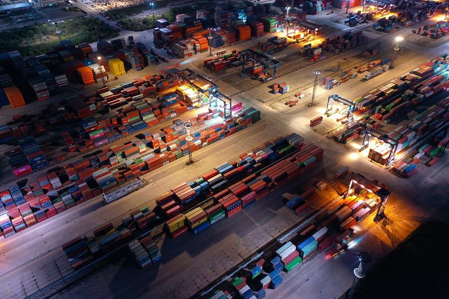 This aerial photo taken on 11 November 2021 shows containers stacked at Nanjing port, Jiangsu province, China. (AFP)