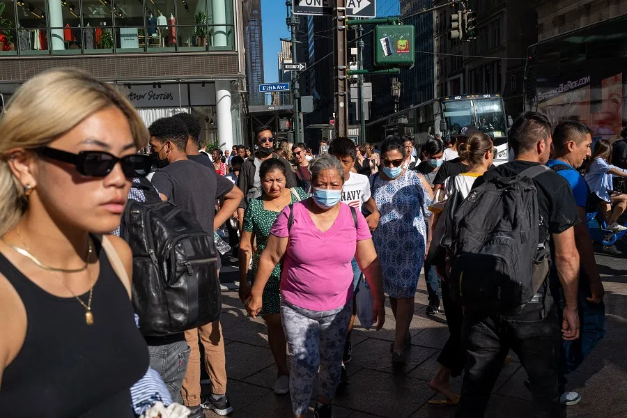 People walk through midtown Manhattan on 3 August 2022 in New York City, US. (Spencer Platt/Getty Images)