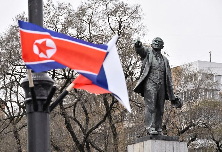 State flags of Russia and North Korea fly in a street near a monument to Soviet state founder Vladimir Lenin during the visit of North Korea’s leader Kim Jong Un to Vladivostok, Russia, on 25 April 2019. (Yuri Maltsev/Reuters)