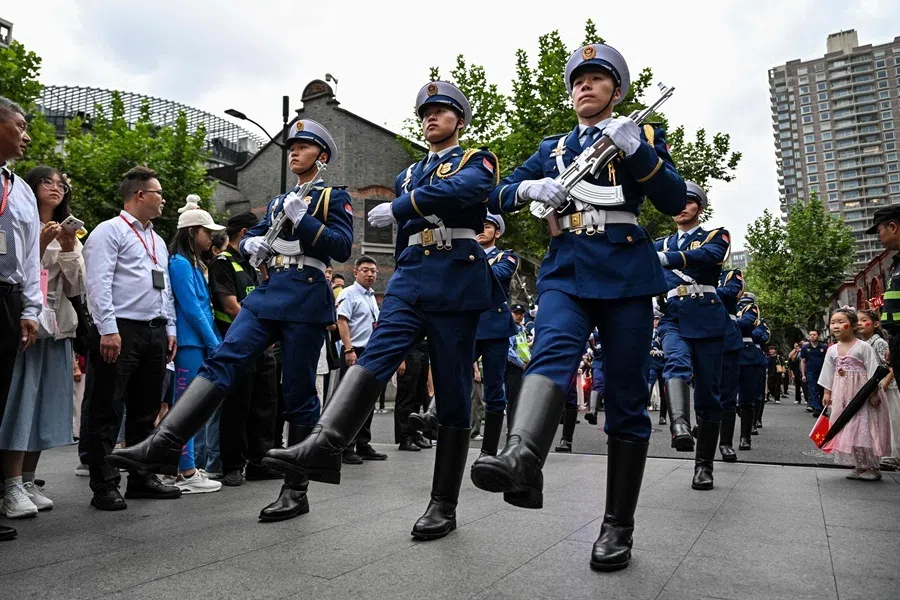 Honour guards walk next to the Museum of the First National Congress of the Chinese Communist Party, on the anniversary of the 1949 founding of the People’s Republic of China, in Shanghai on 1 October 2026.