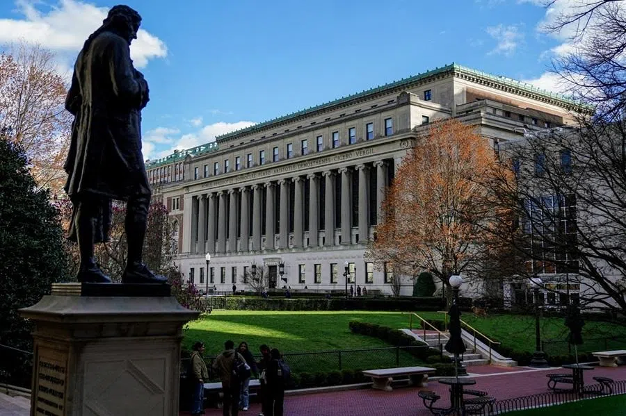 People stand on campus at Columbia University in New York City, US, on 8 April 2025.