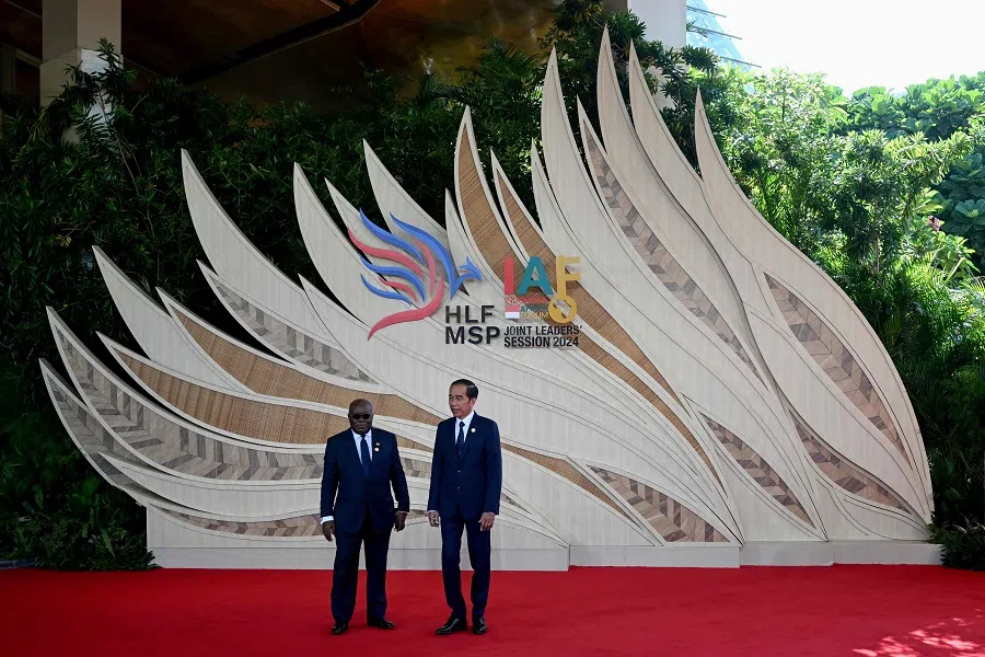Indonesia’s President Joko Widodo (right) welcomes Ghana’s President Nana Akufo-Addo upon arrival at the venue hosting the High-Level Forum on Multi-Stakeholder Partnerships (HLF-MSP) and the Second Indonesia-Africa Forum (IAF) in Nusa Dua on Indonesia’s resort island of Bali on 2 September 2024. (Sonny Tumbelaka/AFP)