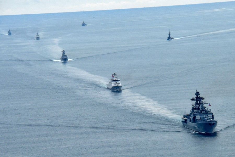 This handout photo taken on 2 December 2021 and released by the Indonesian fleet command Koarmada I on 4 December 2021 shows the Russian destroyer Admiral Panteleyev (right) and other ASEAN countries' ships off the waters of Andaman during a joint exercise between the Indonesian Navy, the Russian Navy and Association of Southeast Asian Nations (ASEAN) members. (Indonesian Fleet Command Koarmada I/AFP)