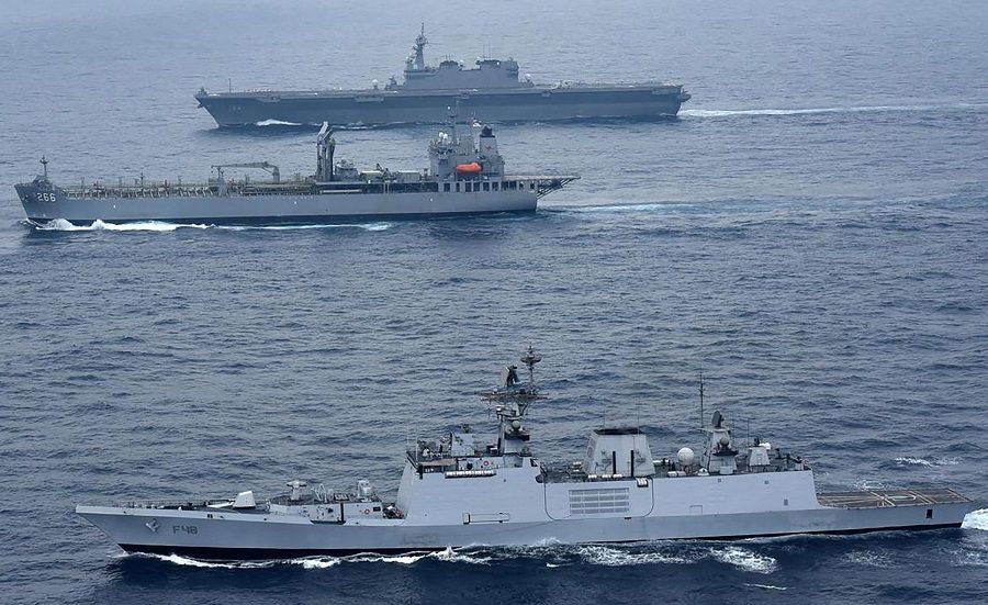 This handout photo released by the Indian Navy on 12 October 2020 shows ships during the second phase of the Malabar naval exercise in which India, Australia, Japan and the US are taking part in the Bay of Bengal in the Indian Ocean. (Indian Navy/AFP)