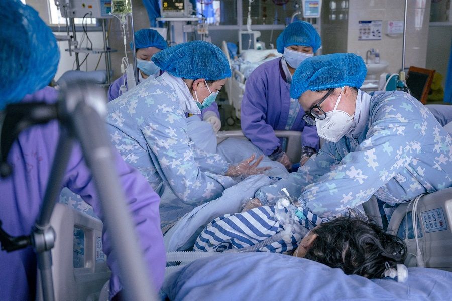 Medical workers rescue a patient at the intensive care unit of Pengshan District People's Hospital, following a surge of Covid-19 infections across the country, in Meishan, Sichuan province, China, on 21 January 2023. (CNS photo via Reuters)