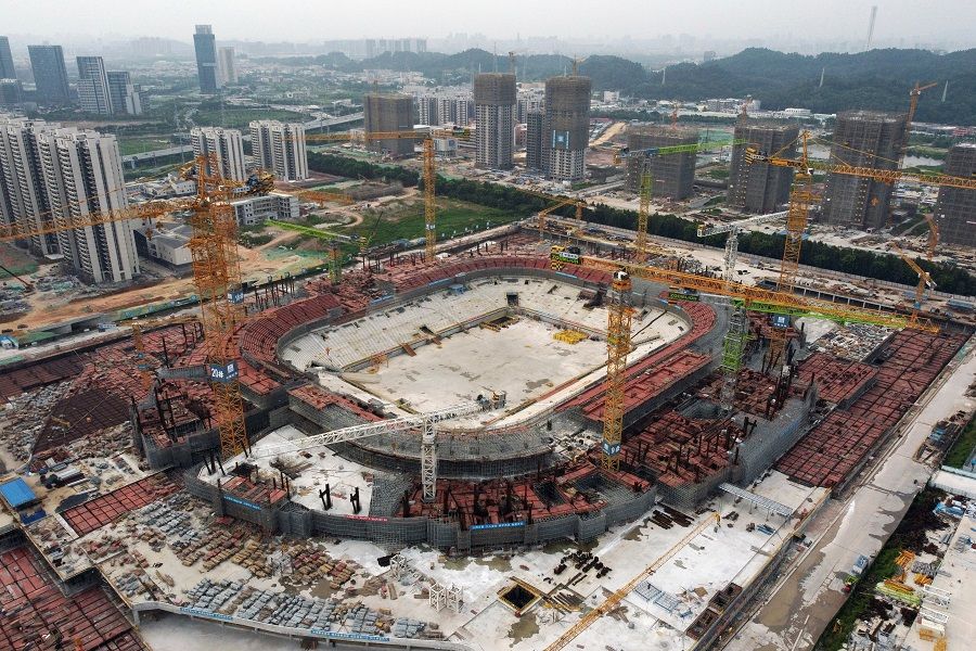 An aerial view shows the construction site of Guangzhou Evergrande Soccer Stadium, a new stadium for Guangzhou FC, developed by China Evergrande Group, in Guangzhou, Guangdong province, China, 26 September 2021. (Thomas Suen/Reuters)