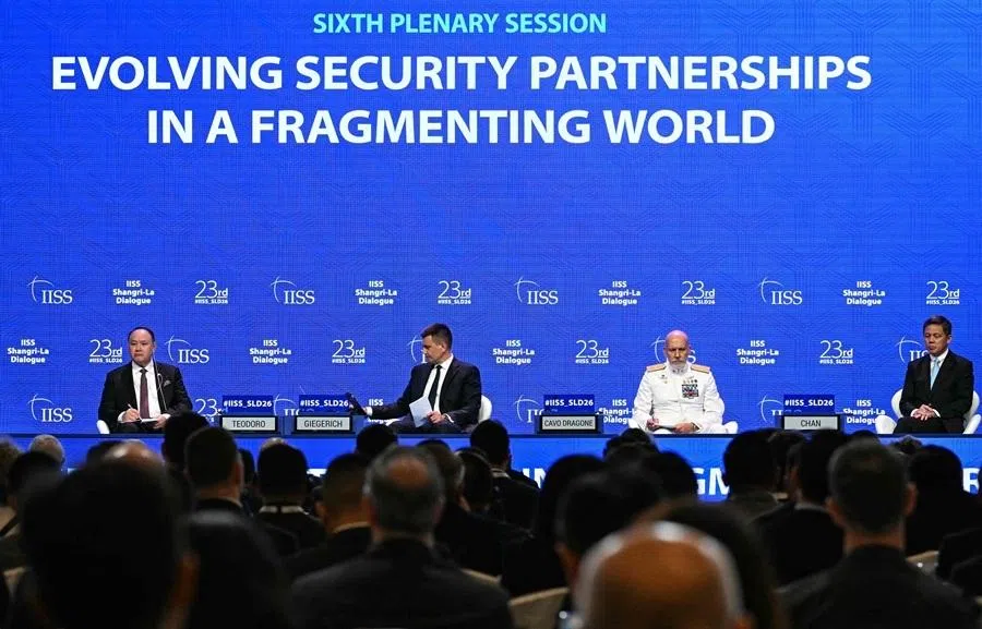 Philippines' Secretary of National Defense Gilberto Teodoro Jr (left), Admiral Giuseppe Cavo Dragone, chair of the NATO Military Committee (centre) and Singapore's Defence Minister Chan Chun Sing (right) attend the sixth plenary session of the 23rd Shangri-La Dialogue summit in Singapore on 31 May 2026.