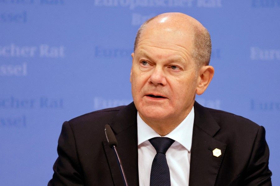 Germany's Chancellor Olaf Scholz holds a press conference during the European leaders summit at the EU parliament in Brussels on 10 February 2023. (Ludovic Marin/AFP)