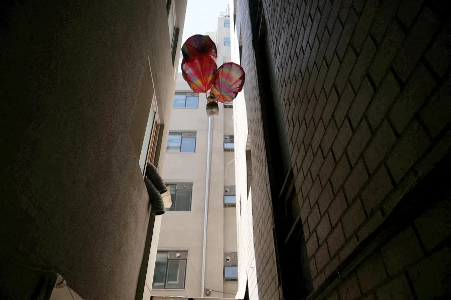 A test run for a speaker device attached to parachutes which will broadcast anti-North Korean messages after being carried over North Korean territory by balloon, in Seoul, South Korea, on 3 June 2024.  (Kim Hong-Ji/Reuters)