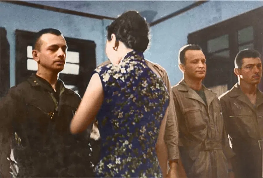 Madame Chiang giving a medal to a pilot in the Doolittle Raid. They landed in over three provinces in China, but all managed to reach Chongqing.