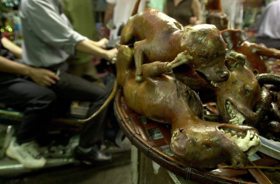 Roast dog meat at a market in Hanoi. (SPH)