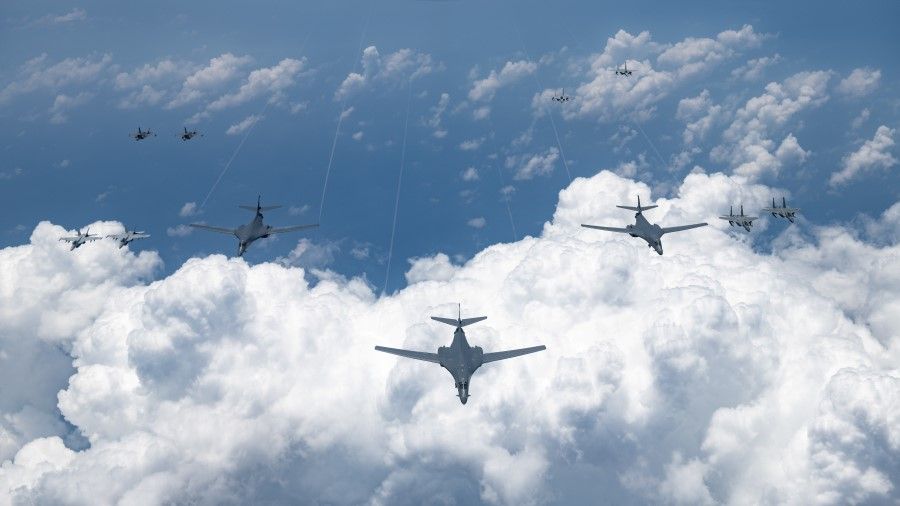 US Air Force, Navy, Marine Corps and Japan Air Self Defense Force aircraft conduct a large-scale joint and bilateral integration training exercise in the Indo-Pacific region 18 August 2020. (US Air Force photo by Staff Sgt. Peter Reft/Handout via REUTERS)