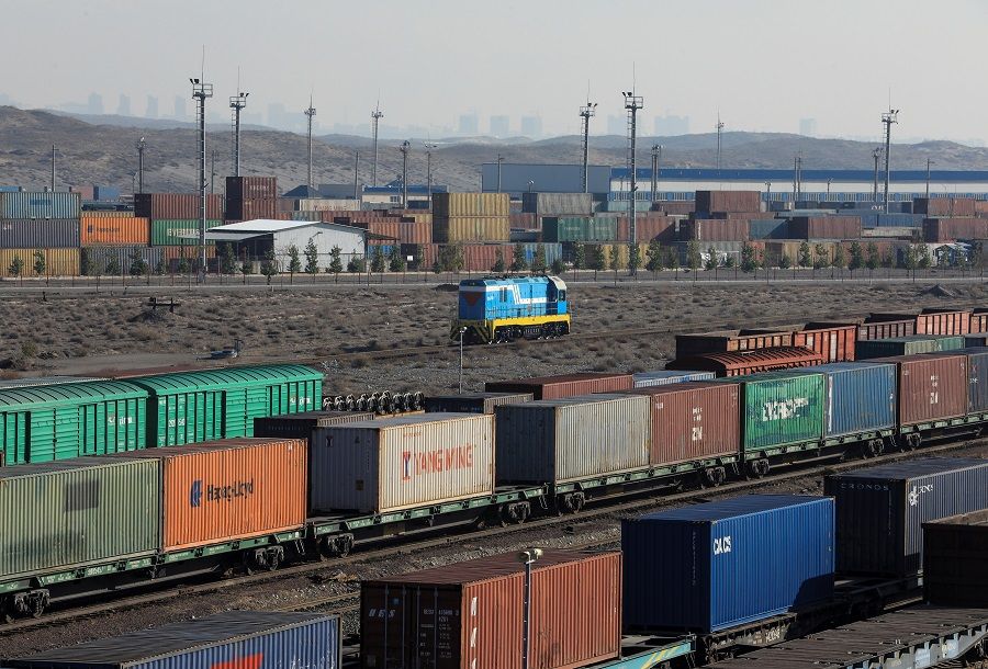 Trains loaded with containers are seen at the Altynkol railway station near the Khorgos border crossing point on the border with China in Kazakhstan, 26 October 2021. (Pavel Mikheyev/Reuters)