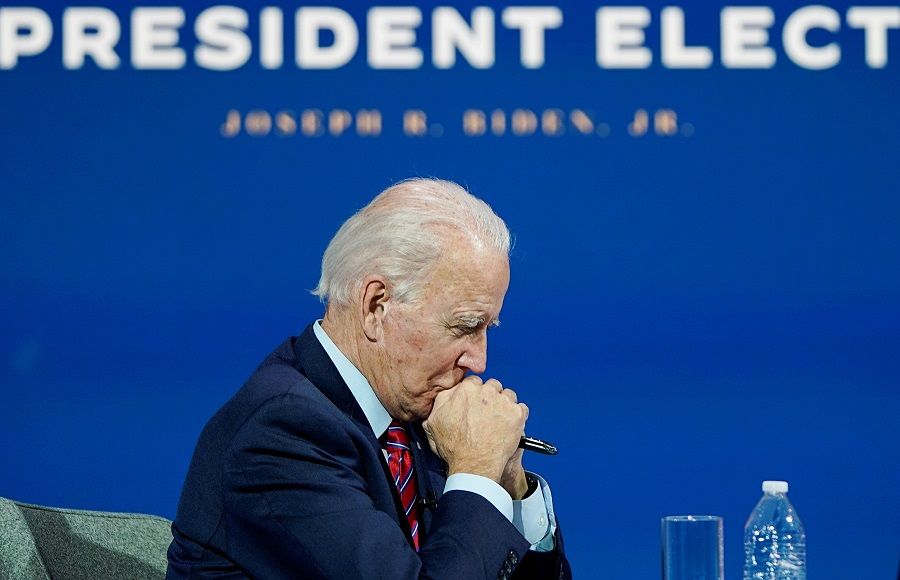 US President-elect Joe Biden listens as he holds a video conference meeting with members of the US Conference of Mayors at his transition headquarters in Wilmington, Delaware, US, 23 November 2020. (Joshua Roberts/Reuters)