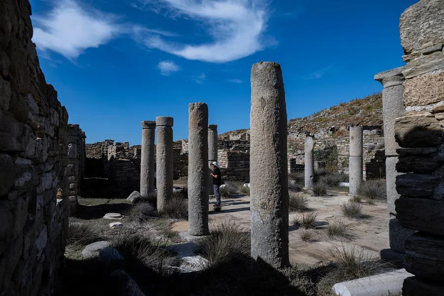 This picture taken on 24 May 2024 shows the Sanctuary of Syrian Gods in the archaeological site of Delos island, Greece. (Aris Messinis/AFP)