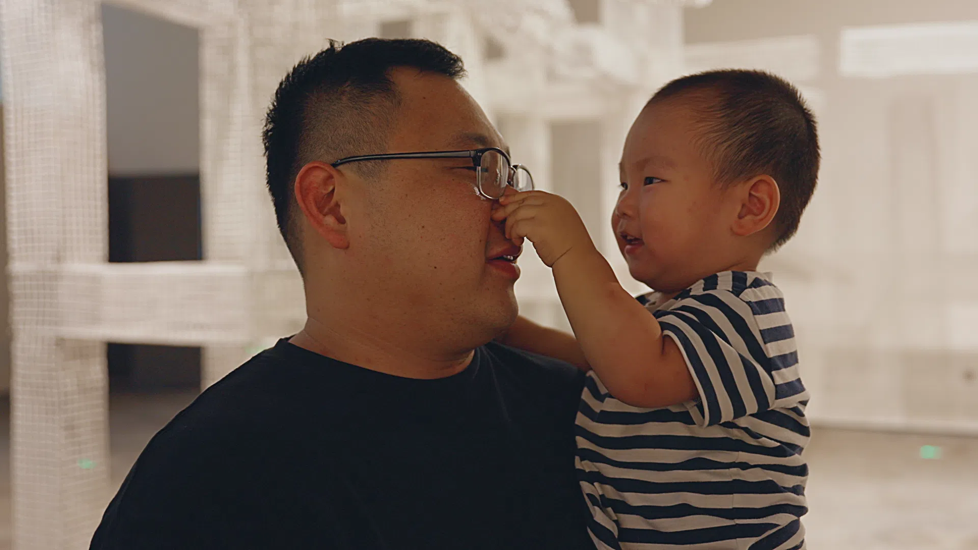 Ken with his two-year-old son.