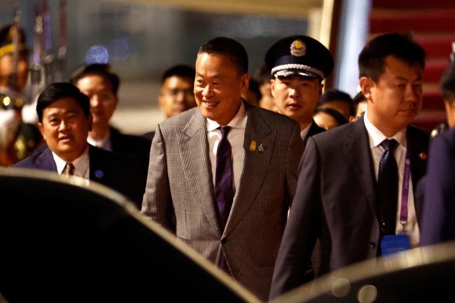 Thailand's Prime Minister Srettha Thavisin arrives at Beijing Capital International Airport to attend the Third Belt and Road Forum in Beijing, China, on 16 October 2023. (Tingshu Wang/Reuters)