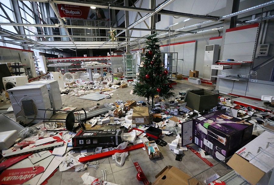 An interior view shows an electronics store that was looted during mass protests in Almaty, Kazakhstan, 9 January 2022. (Pavel Mikheyev/Reuters)