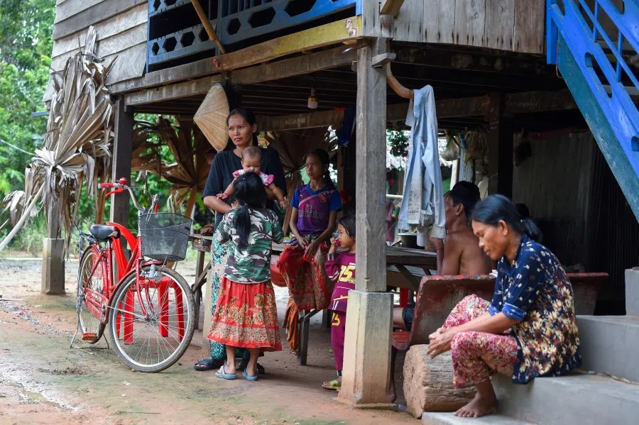 People at a village in Siem Reap province. (Tang Chhin Sothy/AFP)