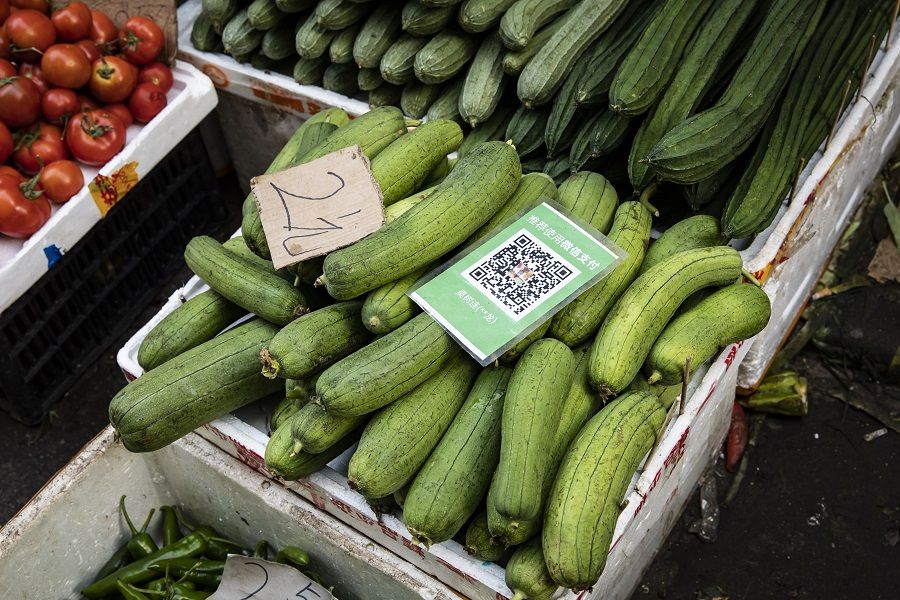 A box of gourds with a QR code for digital payment at an open-air market in Guangzhou, China on 24 May 2021. (Qilai Shen/Bloomberg)