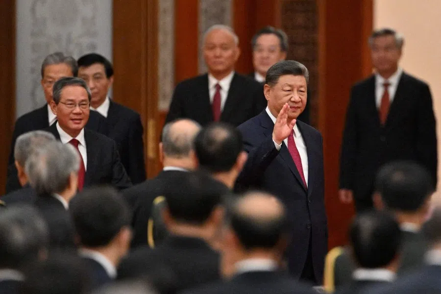 China’s President Xi Jinping enters the hall during the National Day reception on the eve of the 76th founding anniversary of the People’s Republic of China, at the Great Hall of the People in Beijing, China, 30 September 2025. (Maxim Shemetov/Reuters)
